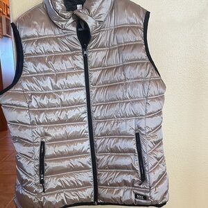 Super cute woman’s xl Rick colored vest. Worn once.